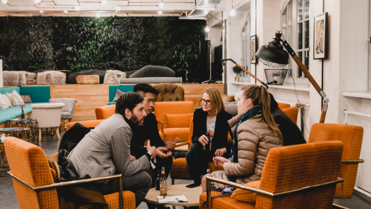 Community talking in the Factory Berlin Görlitzer Park Cafe.